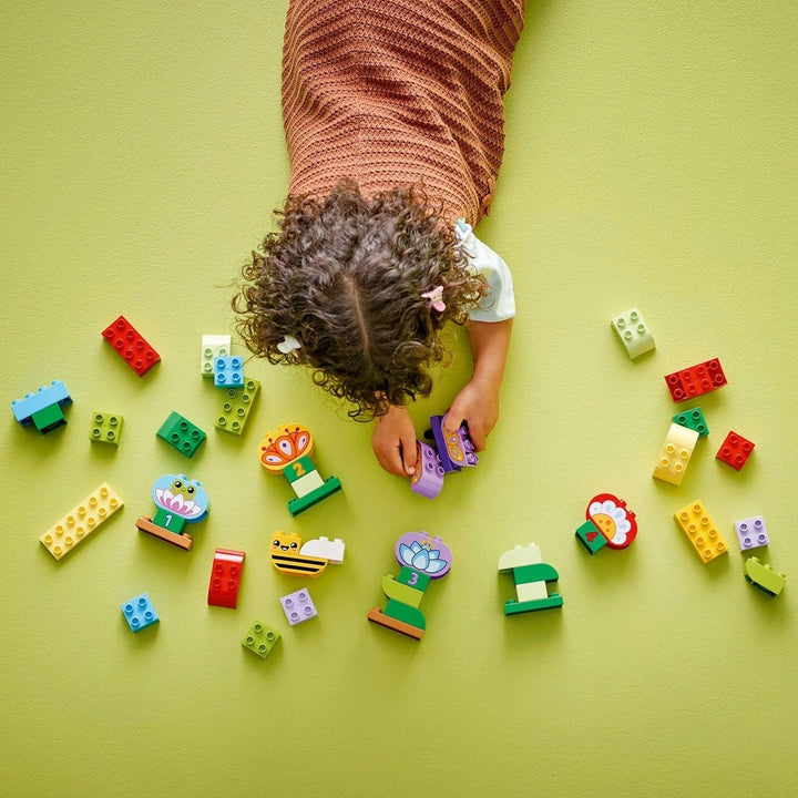 LEGO DUPLO Town Creative Flower Garden, Jucărie stivuibilă, Permite copiilor mici de la 2 ani să se joace imaginativ, Set de construcție pentru a promova dexteritatea, Jucărie educativă pentru copiii preșcolari 10444 Seturi de constructie Besuche den LEGO-Store