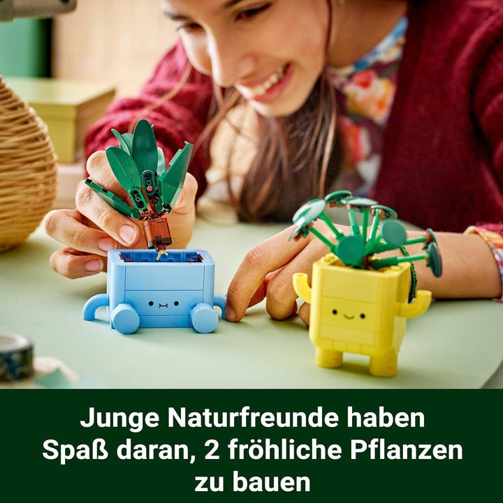 LEGO Botanicals Happy Plants - Set de bricolaj pentru copii cu 2 flori artificiale și 2 ghivece de flori colorate cu fețe de desene animate - Idee de cadou pentru fete de la 9 ani - 10349 Seturi de constructie Besuche den LEGO-Store